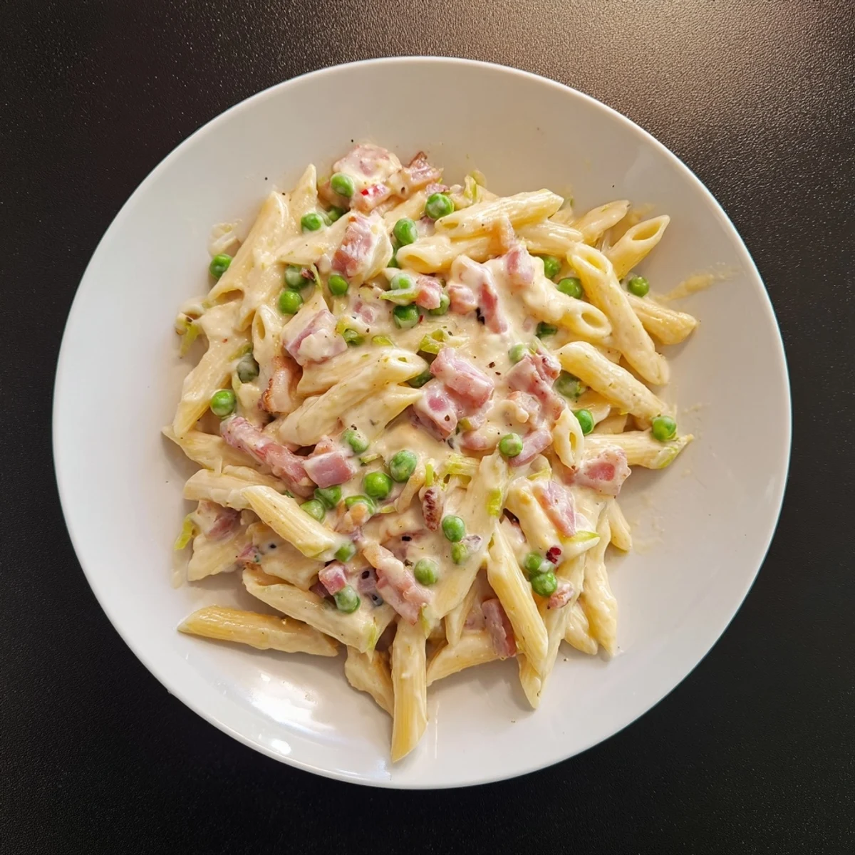 This chilled Easy Bacon Macaroni Salad boasts tender macaroni, savory bacon, and a tangy dressing.