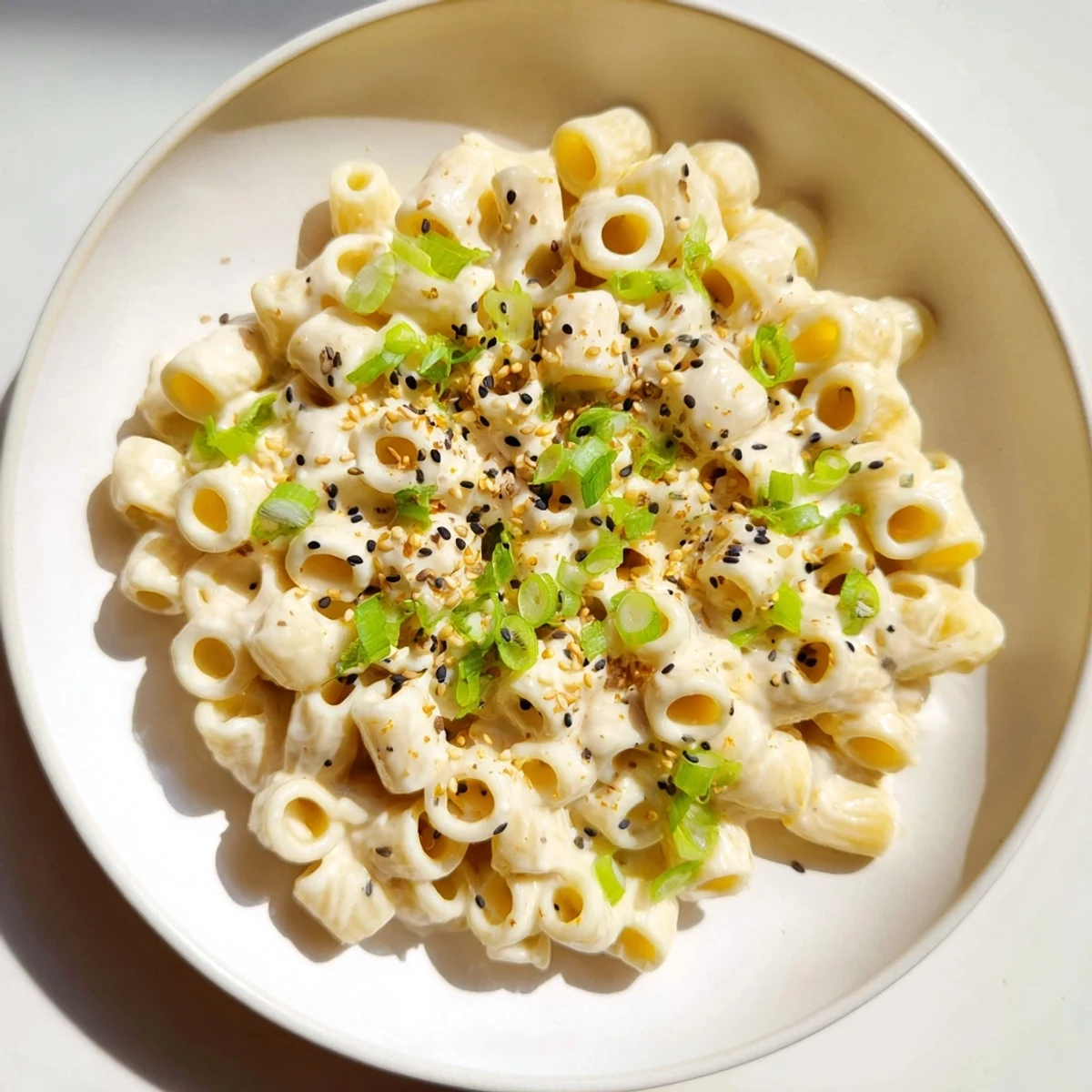 Savory creamy miso ditalini featuring perfectly cooked pasta, coated in a rich, flavorful miso sauce.