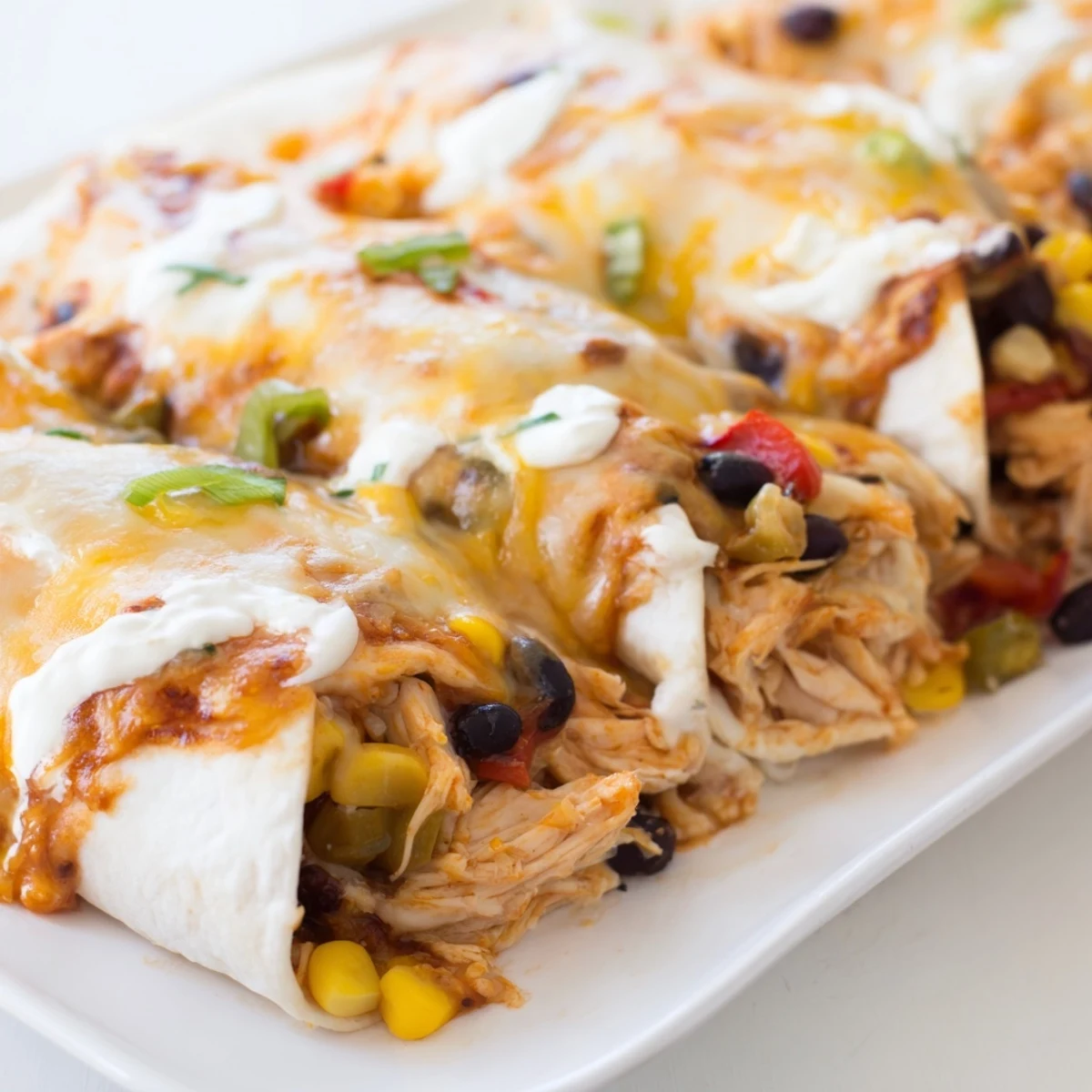 Tender Taco Bell Copycat Chicken Bake with melted cheese, served hot from the oven with a bubbly crust.