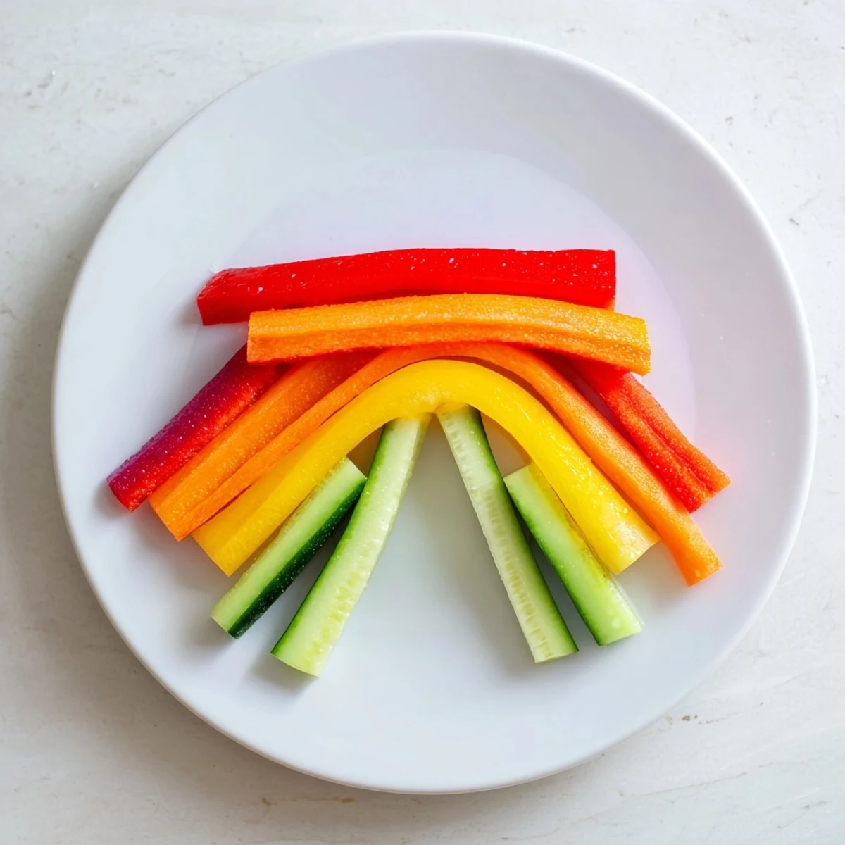 Bright and beautiful photo of Rainbow Arch Veggie Sticks, a colorful and simple snack option for everyone.
