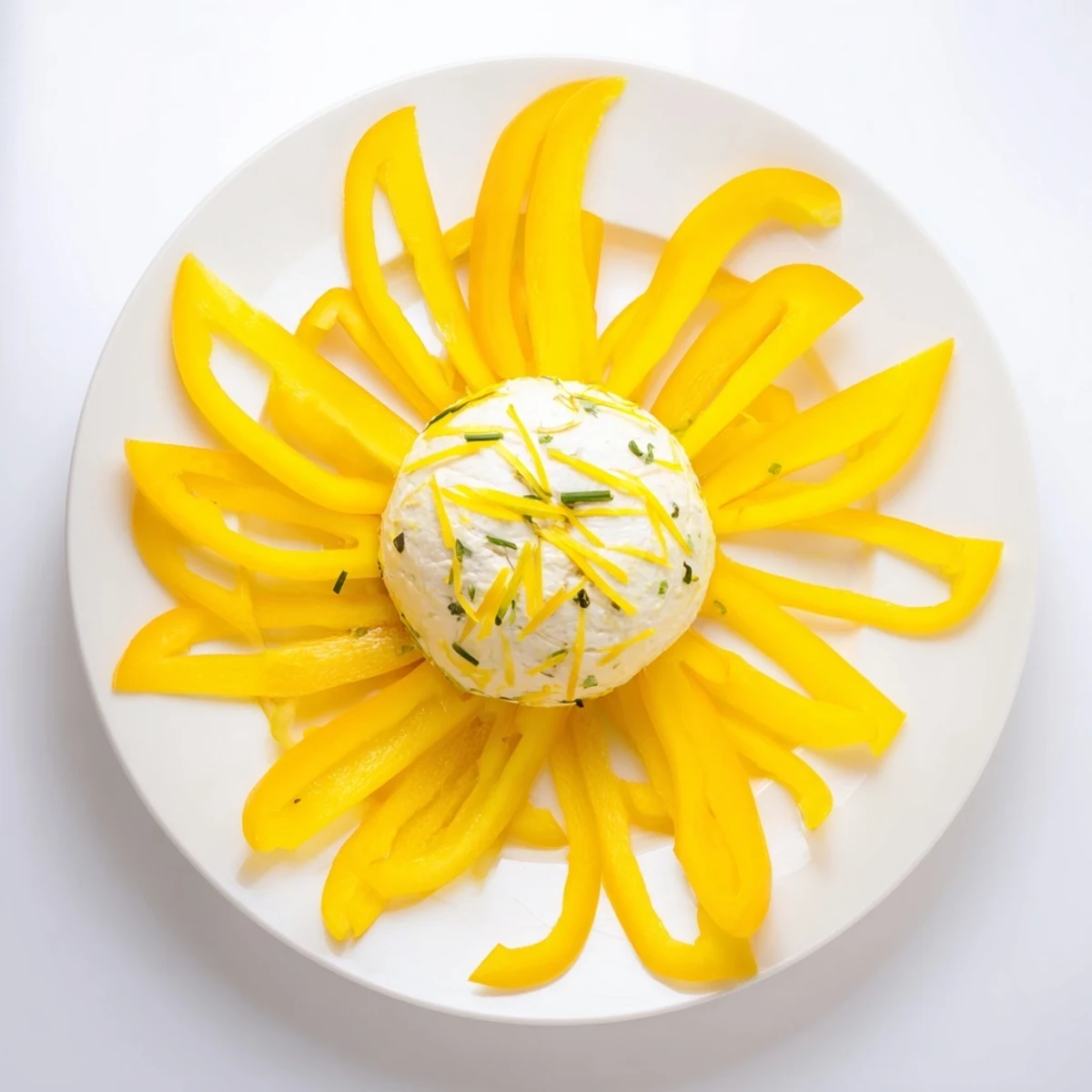 Bright and fresh: imagine the Tuscan Sunburst, a flavorful goat cheese and pepper appetizer ready to serve.