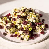 Bite into Matcha White Chocolate Cranberry Bark Clusters, creamy white chocolate dotted with sweet cranberries.