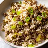Ground meat and vegetables simmered with spices for an appetizing Cajun Dirty Rice recipe image.
