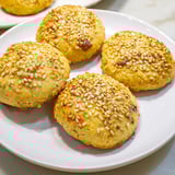 Warm honey-glazed Tunisian Makroudh cookies, perfect with mint tea, ready to be enjoyed.