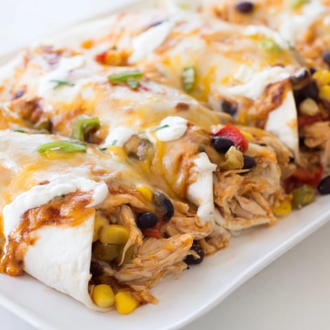 Tender Taco Bell Copycat Chicken Bake with melted cheese, served hot from the oven with a bubbly crust.