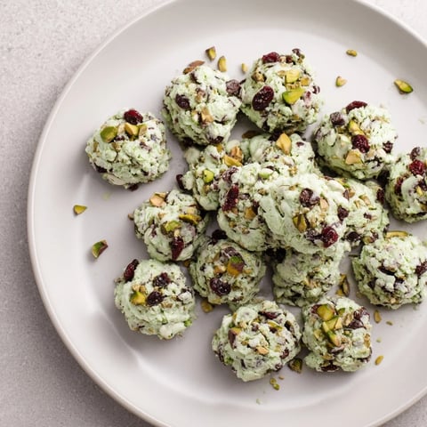 Matcha White Chocolate Cranberry Bark Clusters, a vibrant treat with green matcha and ruby cranberries.