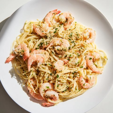 Lemony Lemon Herb Pasta with Shrimp, a flavorful pasta dish with perfectly cooked shrimp and vibrant herbs.