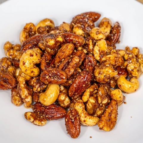 Golden roasted Spiced Nuts Mix with honey glaze, a crunchy, sweet-and-savory snack perfect for entertaining.  