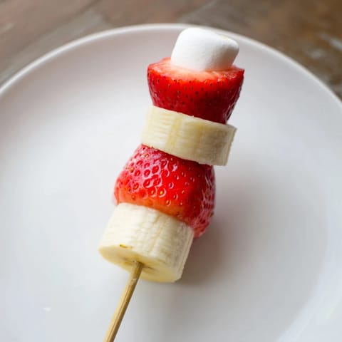 Festive close-up: Homemade Strawberry Banana Santa Sticks, a delightful holiday snack for kids.