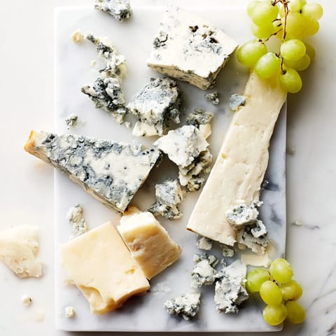 Irregular blue cheese and cheddar chunks create this impressive Marble Quarry appetizer, ready to serve and enjoy.
