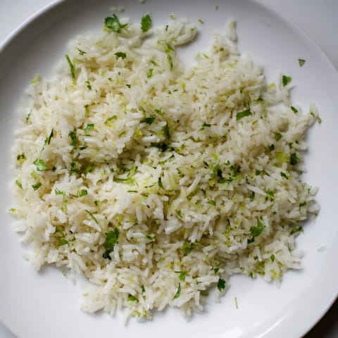 Fresh, vibrant Cilantro Lime Rice, a side dish featuring bright green cilantro and zest.