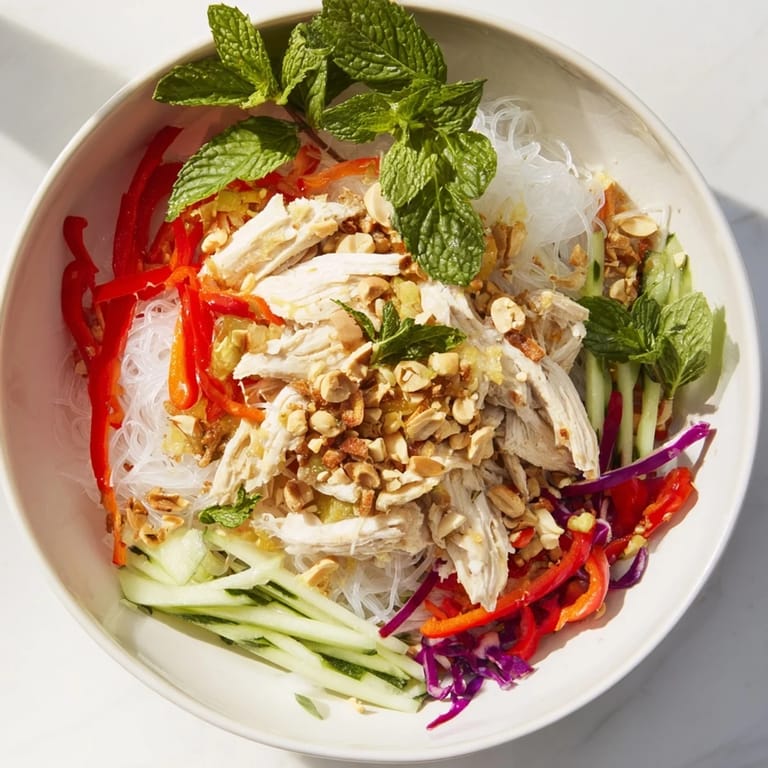 This Vietnamese Crunch Noodle Salad with Shredded Chicken features vibrant vegetables, tender chicken, and a zesty dressing.