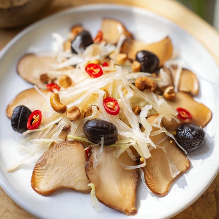 Savory Umami Bomb Asian Delight board, beautifully displayed with a variety of textures, including crunchy nuts and pickled daikon.