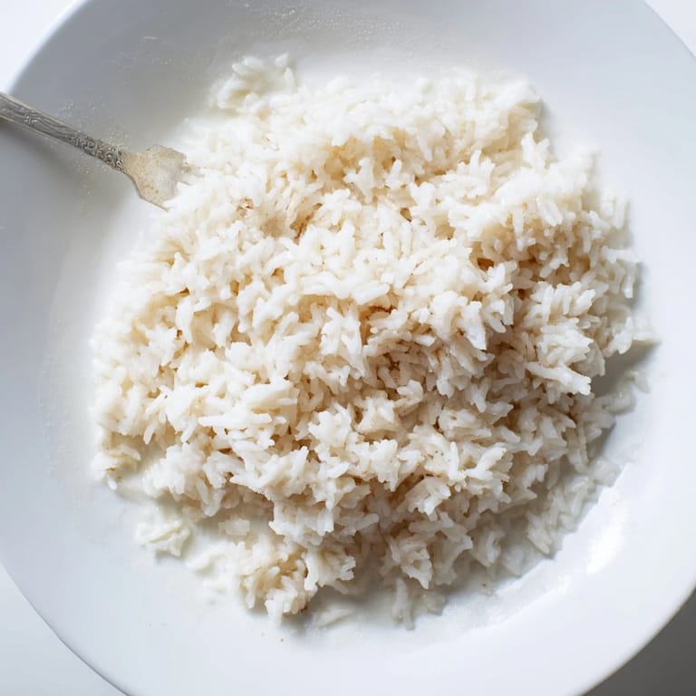 This creamy Coconut Jasmine Rice showcases perfect, tender grains; a delicious side.